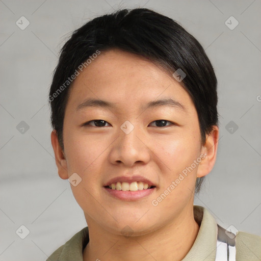 Joyful asian young-adult female with short  brown hair and brown eyes