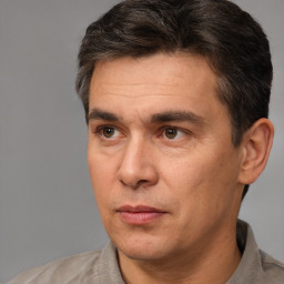 Neutral white adult male with short  brown hair and brown eyes