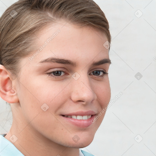 Joyful white young-adult female with short  brown hair and grey eyes