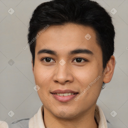 Joyful latino young-adult male with short  brown hair and brown eyes