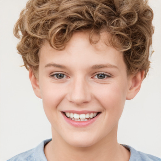 Joyful white child male with short  brown hair and brown eyes