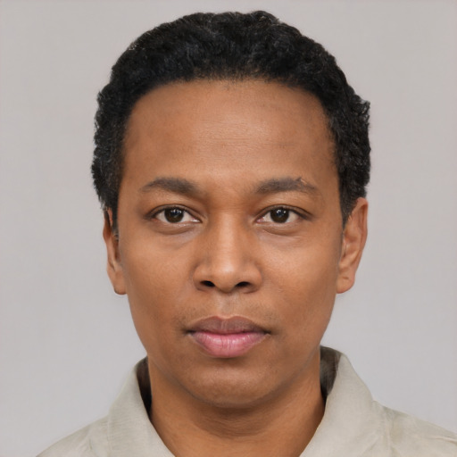 Neutral black young-adult male with short  black hair and brown eyes
