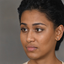 Neutral black young-adult female with short  brown hair and brown eyes