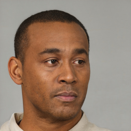 Neutral black young-adult male with short  brown hair and brown eyes