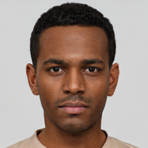 Neutral black young-adult male with short  black hair and brown eyes
