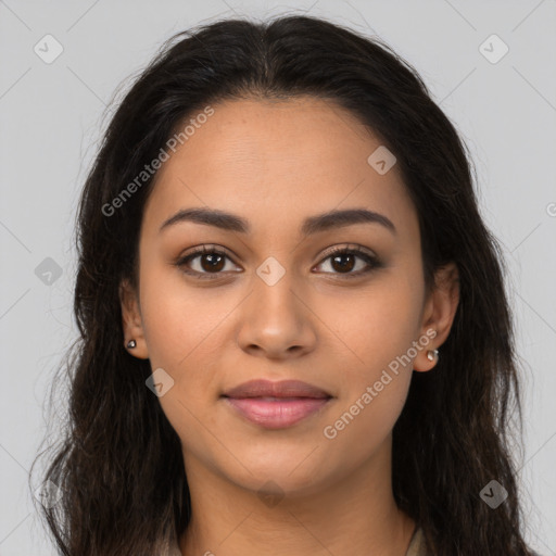 Joyful latino young-adult female with long  brown hair and brown eyes