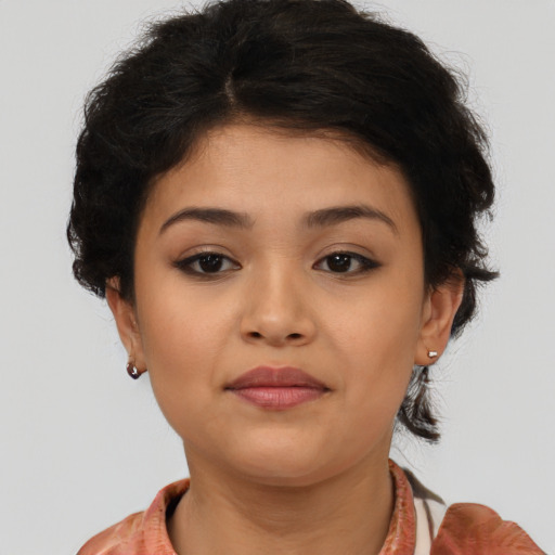 Neutral latino young-adult female with medium  brown hair and brown eyes