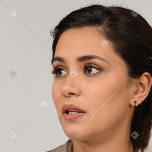 Neutral white young-adult female with medium  brown hair and brown eyes