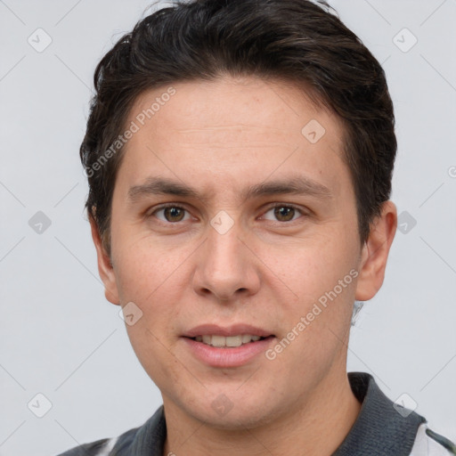 Joyful white adult male with short  brown hair and brown eyes