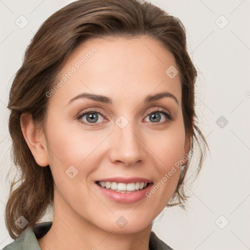 Joyful white young-adult female with medium  brown hair and green eyes