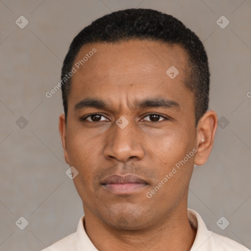 Neutral latino young-adult male with short  black hair and brown eyes