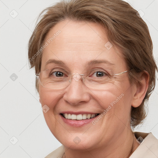 Joyful white adult female with medium  brown hair and blue eyes