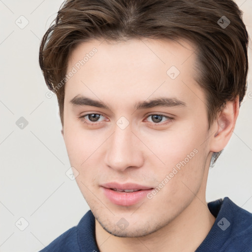 Neutral white young-adult male with short  brown hair and brown eyes