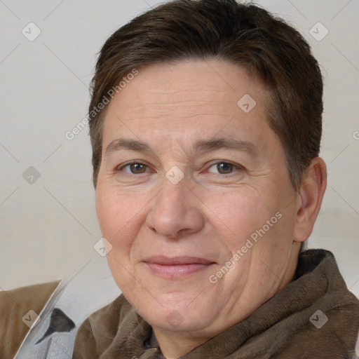 Joyful white adult female with short  brown hair and brown eyes