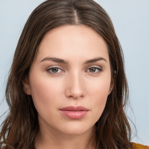 Neutral white young-adult female with long  brown hair and brown eyes