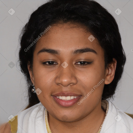 Joyful latino young-adult female with short  black hair and brown eyes