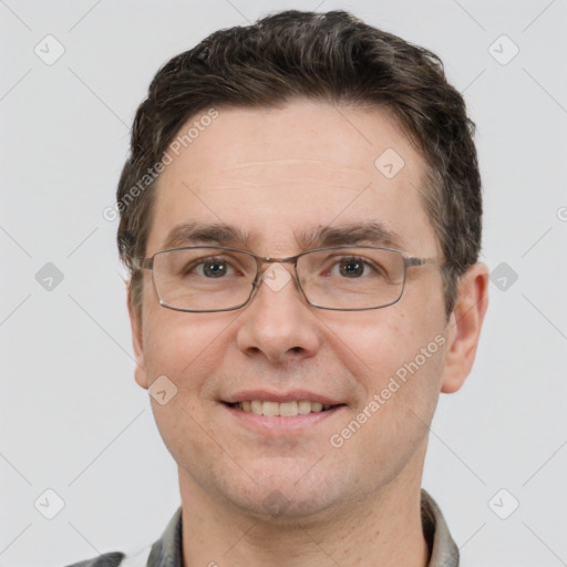 Joyful white adult male with short  brown hair and grey eyes