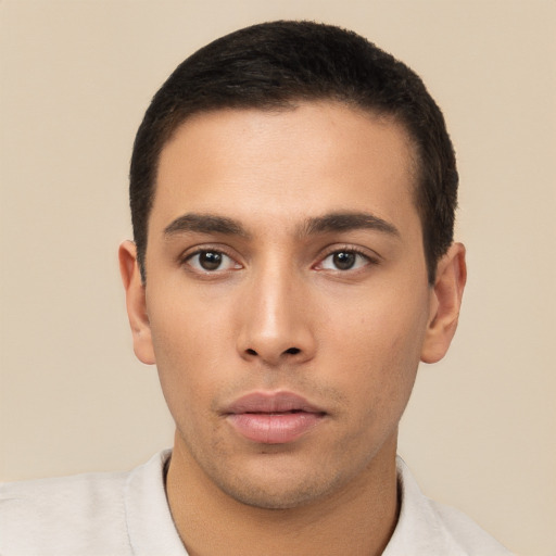 Neutral latino young-adult male with short  black hair and brown eyes