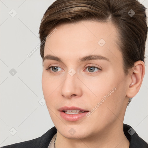 Joyful white young-adult female with short  brown hair and brown eyes