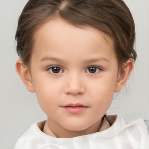 Neutral white child female with short  brown hair and brown eyes