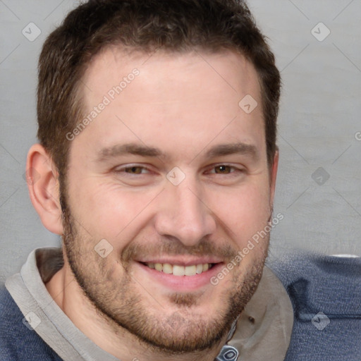 Joyful white adult male with short  brown hair and brown eyes