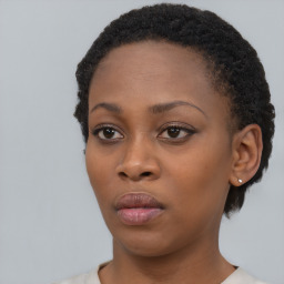 Neutral black young-adult female with short  black hair and brown eyes