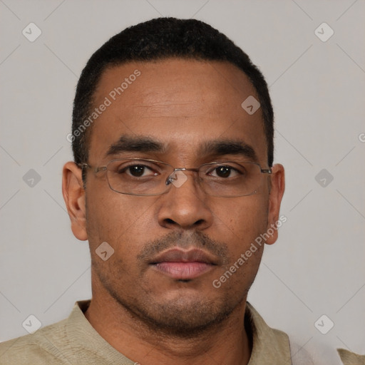 Neutral black young-adult male with short  black hair and brown eyes