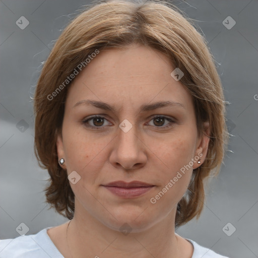 Joyful white adult female with medium  brown hair and brown eyes