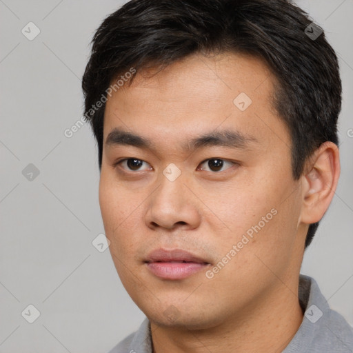 Neutral asian young-adult male with short  brown hair and brown eyes