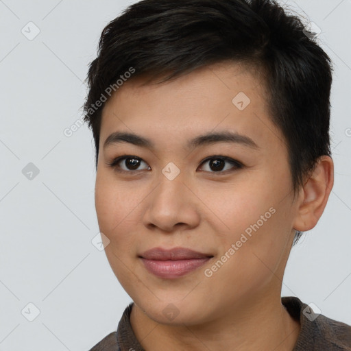 Joyful asian young-adult female with short  brown hair and brown eyes