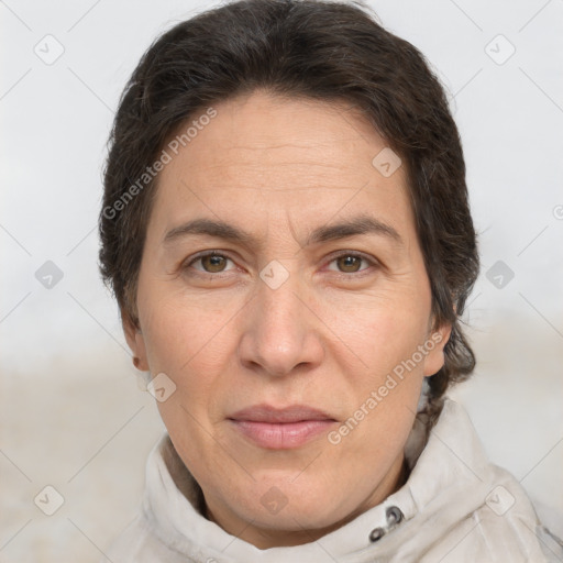 Joyful white adult female with short  brown hair and brown eyes