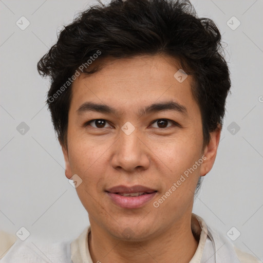 Joyful latino young-adult male with short  brown hair and brown eyes