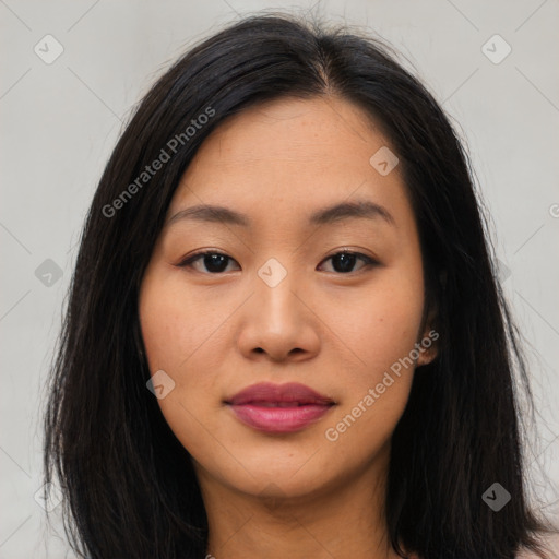 Joyful asian young-adult female with long  brown hair and brown eyes