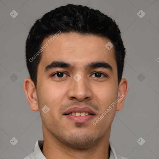 Joyful latino young-adult male with short  brown hair and brown eyes