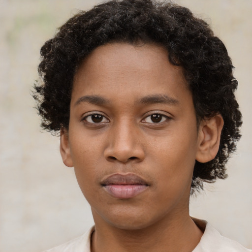 Neutral black young-adult female with short  black hair and brown eyes