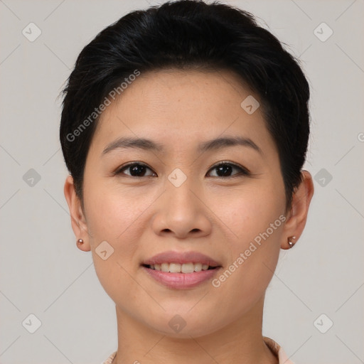 Joyful asian young-adult female with short  brown hair and brown eyes