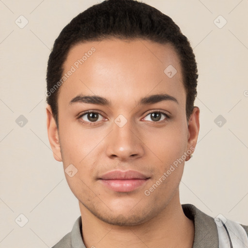 Joyful white young-adult male with short  black hair and brown eyes