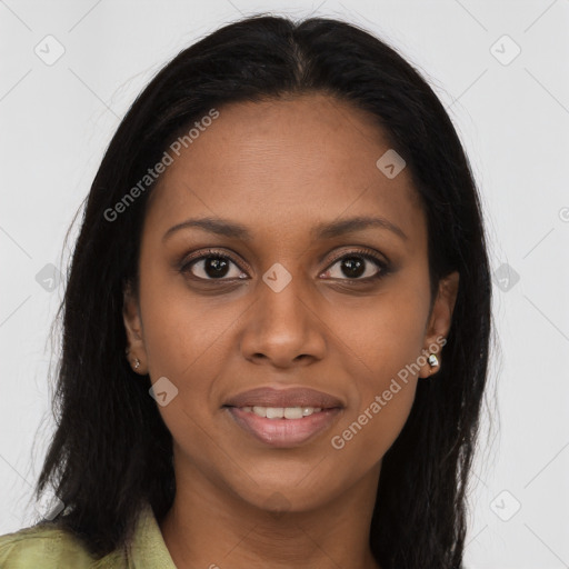 Joyful black young-adult female with long  brown hair and brown eyes