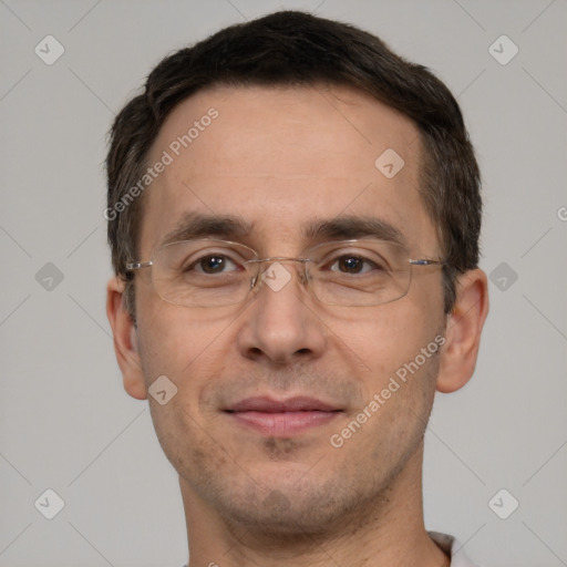 Joyful white adult male with short  brown hair and brown eyes