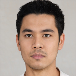 Neutral asian young-adult male with short  black hair and brown eyes