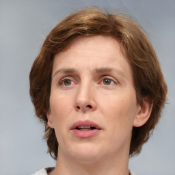 Neutral white adult female with medium  brown hair and brown eyes