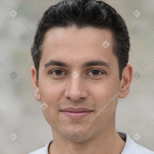 Joyful white young-adult male with short  brown hair and brown eyes