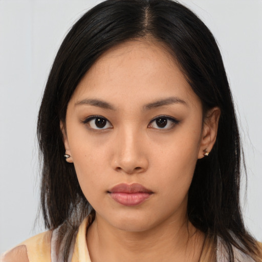 Neutral asian young-adult female with long  brown hair and brown eyes