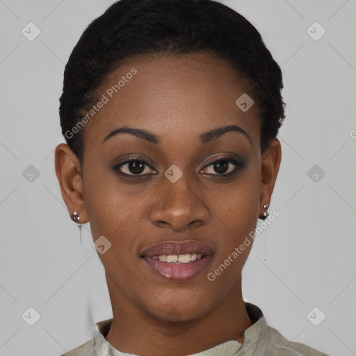 Joyful black young-adult female with short  black hair and brown eyes