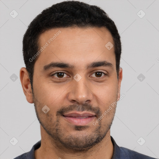 Joyful latino young-adult male with short  black hair and brown eyes