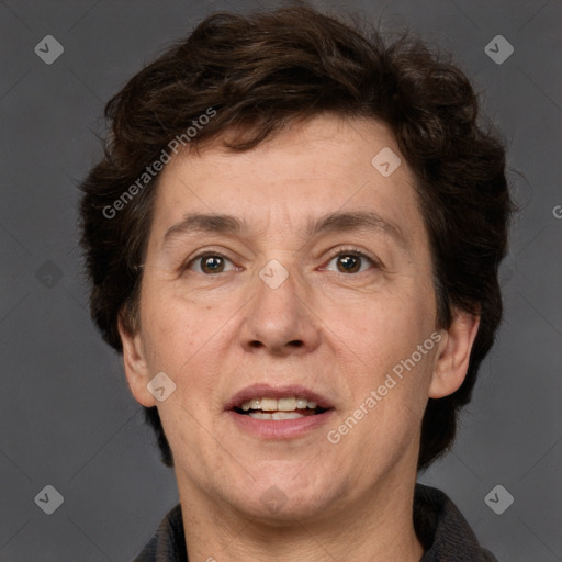 Joyful white adult male with short  brown hair and grey eyes