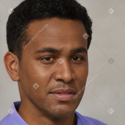 Neutral latino young-adult male with short  brown hair and brown eyes