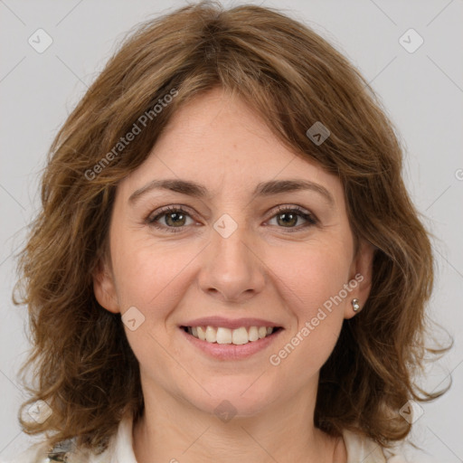 Joyful white young-adult female with medium  brown hair and green eyes