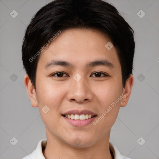 Joyful asian young-adult male with short  brown hair and brown eyes