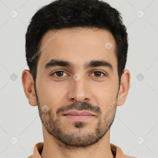 Joyful latino young-adult male with short  brown hair and brown eyes